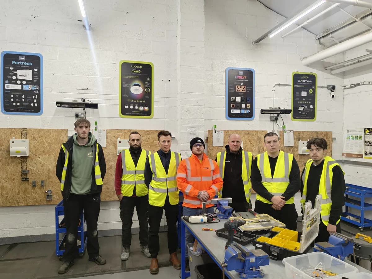 Seven students completing building services units at Total Skills Nottingham training centre