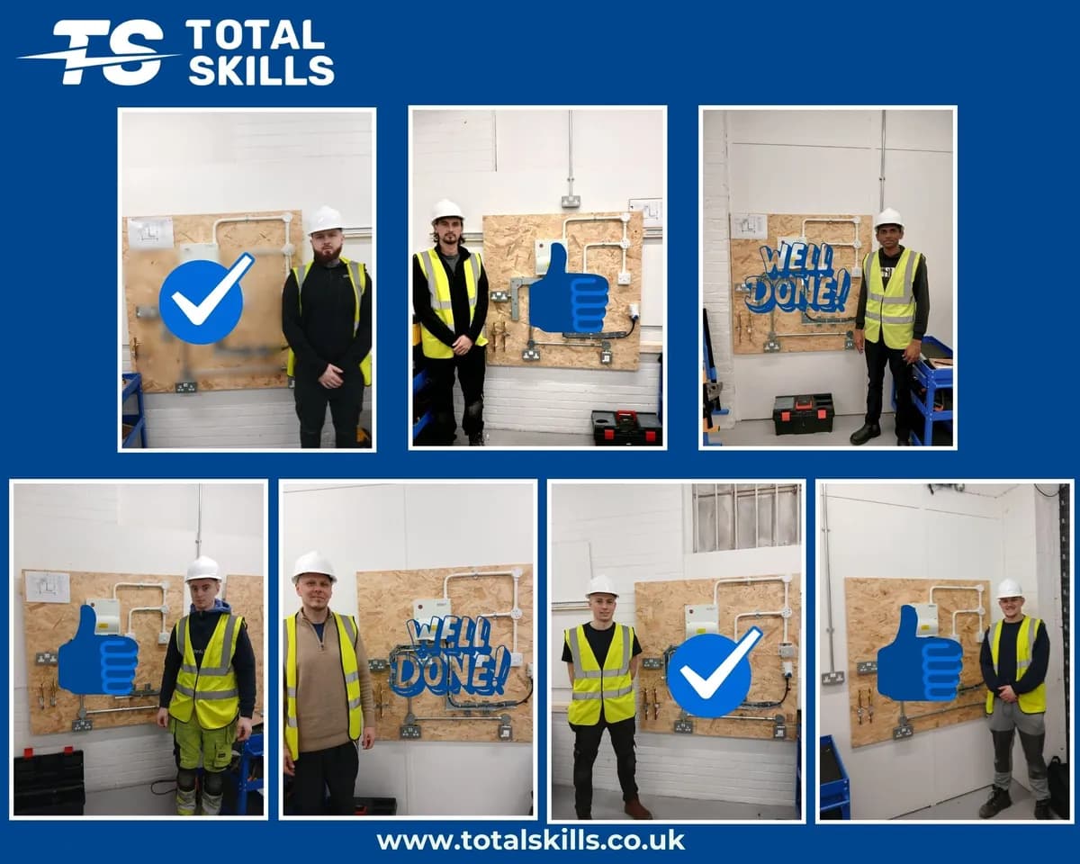 Seven electrical students celebrating completing their 2365 Level 2 Diploma at Total Skills Nottingham training centre
