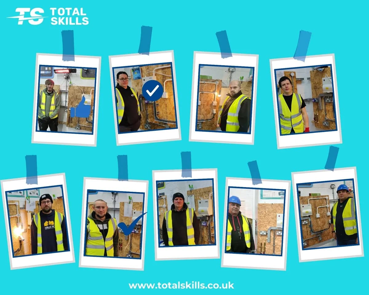 Nine electrical students celebrating passing their 2365 Level 2 final assessment at Total Skills Nottingham training centre