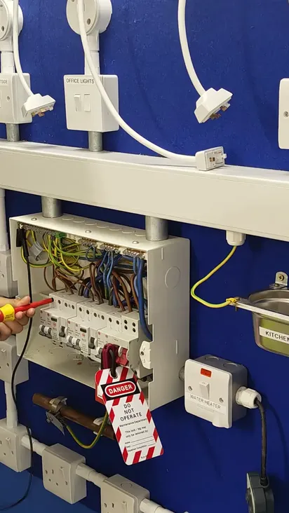 Electrical training workshop with switches and sockets at Total Skills UK